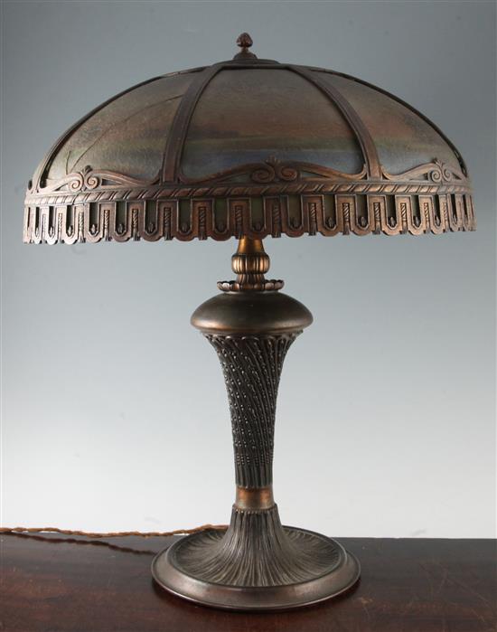 An early 20th century American bronzed metal and tinted glass table lamp, H.22in.